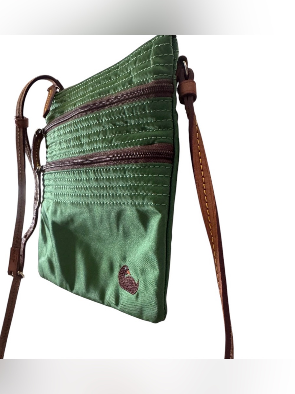 Dooney & Bourke Nylon North South Triple Zip Crossbody.Color: Kelly green nylon. - Picture 6 of 12